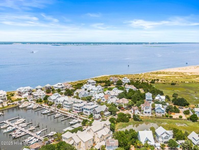 Coastal charm on one of the island's most iconic corners. At the on Bald Head Island Golf Club in North Carolina - for sale on GolfHomes.com, golf home, golf lot