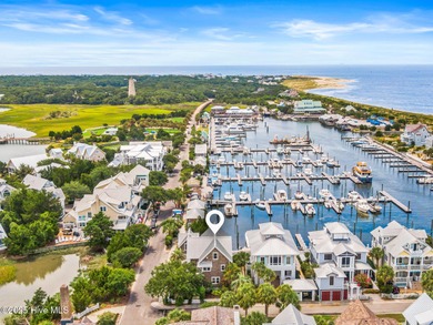Coastal charm on one of the island's most iconic corners. At the on Bald Head Island Golf Club in North Carolina - for sale on GolfHomes.com, golf home, golf lot