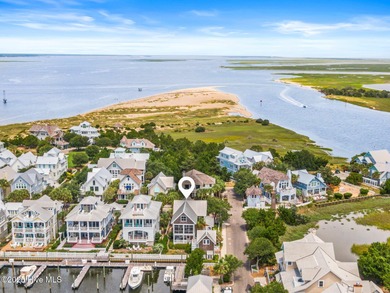Coastal charm on one of the island's most iconic corners. At the on Bald Head Island Golf Club in North Carolina - for sale on GolfHomes.com, golf home, golf lot