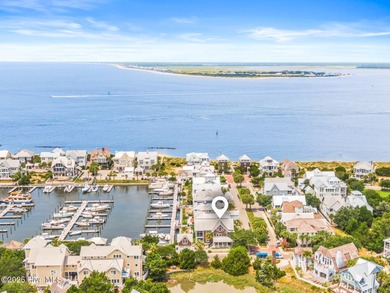 Coastal charm on one of the island's most iconic corners. At the on Bald Head Island Golf Club in North Carolina - for sale on GolfHomes.com, golf home, golf lot
