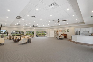 This elegant 3-bedroom, 2.5-bath home with an oversized 2.5-car on Waterford Golf Club in Florida - for sale on GolfHomes.com, golf home, golf lot