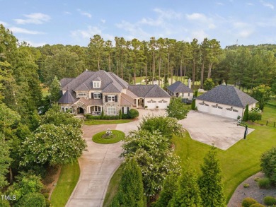Welcome to an unparalleled sanctuary of luxury!  This on Hasentree Club in North Carolina - for sale on GolfHomes.com, golf home, golf lot