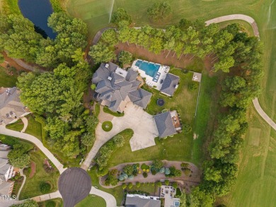 Welcome to an unparalleled sanctuary of luxury!  This on Hasentree Club in North Carolina - for sale on GolfHomes.com, golf home, golf lot
