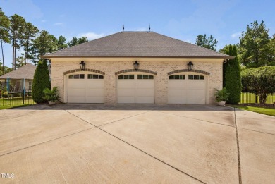 Welcome to an unparalleled sanctuary of luxury!  This on Hasentree Club in North Carolina - for sale on GolfHomes.com, golf home, golf lot