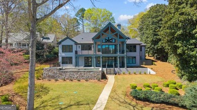 COMPLETELY RENOVATED. REIMAGINED. PRACTICALLY REBUILT FROM THE on Great Waters Course At Reynolds Plantation in Georgia - for sale on GolfHomes.com, golf home, golf lot