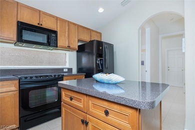 Experience Southwest Florida living in this thoughtfully on Heritage Palms Golf and Country Club in Florida - for sale on GolfHomes.com, golf home, golf lot