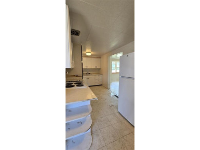 Located just two blocks from Hot Springs State Park and the on Legion Town And Country Club in Wyoming - for sale on GolfHomes.com, golf home, golf lot