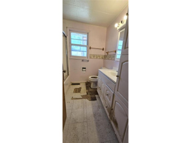 Located just two blocks from Hot Springs State Park and the on Legion Town And Country Club in Wyoming - for sale on GolfHomes.com, golf home, golf lot