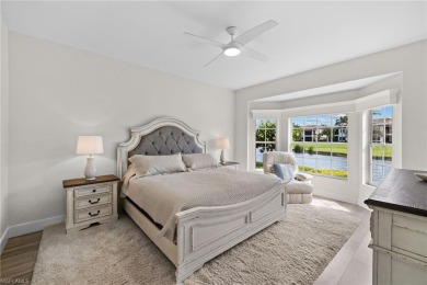 Enjoy breathtaking panoramic lake and golf course views of on Windstar on Naples Bay in Florida - for sale on GolfHomes.com, golf home, golf lot