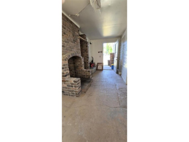 Located just two blocks from Hot Springs State Park and the on Legion Town And Country Club in Wyoming - for sale on GolfHomes.com, golf home, golf lot