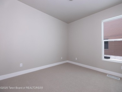 Ask about current builder incentives! Welcome to 283 Bald Eagle on Teton Reserve in Idaho - for sale on GolfHomes.com, golf home, golf lot