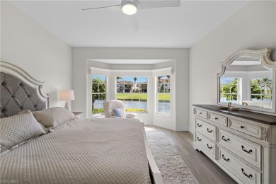 Enjoy breathtaking panoramic lake and golf course views of on Windstar on Naples Bay in Florida - for sale on GolfHomes.com, golf home, golf lot