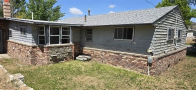 Located just two blocks from Hot Springs State Park and the on Legion Town And Country Club in Wyoming - for sale on GolfHomes.com, golf home, golf lot