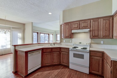 This 4-bedroom 3-bathroom home is conveniently located in on Ledgestone Country Club and Golf Course in Missouri - for sale on GolfHomes.com, golf home, golf lot