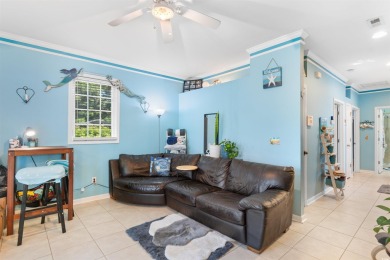 Welcome to your charming coastal retreat! Tucked within a golf on Indigo Creek Golf Club in South Carolina - for sale on GolfHomes.com, golf home, golf lot