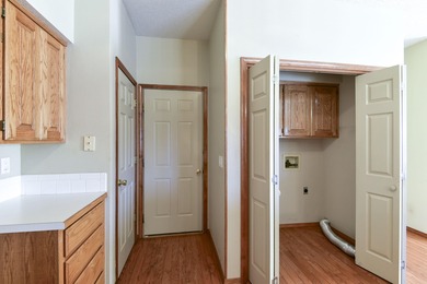 This 4-bedroom 3-bathroom home is conveniently located in on Ledgestone Country Club and Golf Course in Missouri - for sale on GolfHomes.com, golf home, golf lot