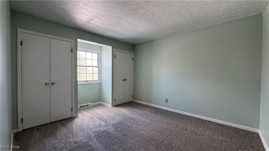 Four-bedroom, two-and-a-half-bath Colonial-style condominium in on Tanglewood National Golf Club in Ohio - for sale on GolfHomes.com, golf home, golf lot