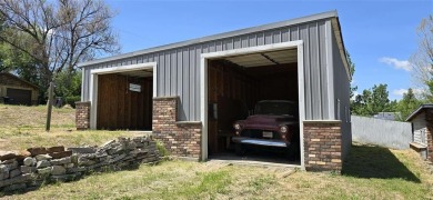 Located just two blocks from Hot Springs State Park and the on Legion Town And Country Club in Wyoming - for sale on GolfHomes.com, golf home, golf lot