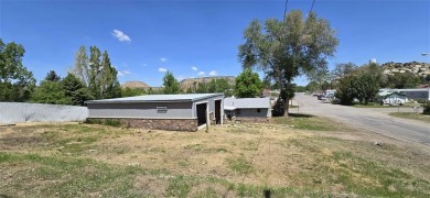 Located just two blocks from Hot Springs State Park and the on Legion Town And Country Club in Wyoming - for sale on GolfHomes.com, golf home, golf lot
