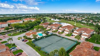 Enjoy breathtaking panoramic lake and golf course views of on Windstar on Naples Bay in Florida - for sale on GolfHomes.com, golf home, golf lot