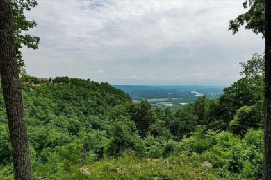 Welcome to Jasper Highlands. The 2 lots that the property on Sequatchie Valley Golf and Country Club in Tennessee - for sale on GolfHomes.com, golf home, golf lot