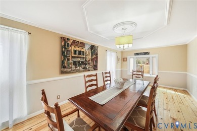 Embrace the art of waterfront living in this timeless retreat on Indian Creek Yacht and Country Club in Virginia - for sale on GolfHomes.com, golf home, golf lot