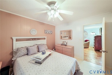 Embrace the art of waterfront living in this timeless retreat on Indian Creek Yacht and Country Club in Virginia - for sale on GolfHomes.com, golf home, golf lot