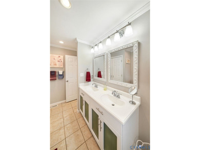 Embrace the art of waterfront living in this timeless retreat on Indian Creek Yacht and Country Club in Virginia - for sale on GolfHomes.com, golf home, golf lot