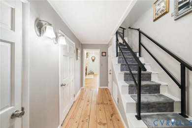 Embrace the art of waterfront living in this timeless retreat on Indian Creek Yacht and Country Club in Virginia - for sale on GolfHomes.com, golf home, golf lot