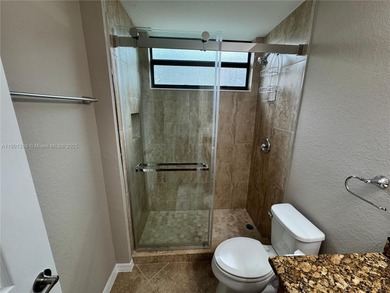 END UNIT w/BUNDLED GOLF! This renovated 1st floor condo in on Bonita National Golf Course in Florida - for sale on GolfHomes.com, golf home, golf lot