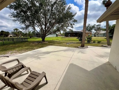 Move right in to this 3/2 with bonus room and garage on a on Seminole Lakes Country Club in Florida - for sale on GolfHomes.com, golf home, golf lot