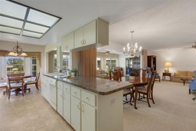 If you like open  airy spaces with abundant natural light and on Highland Lakes Executive Golf Course in Florida - for sale on GolfHomes.com, golf home, golf lot