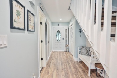 Discover elegance in this beautifully renovated townhome in on Meadowood Golf and Tennis Club in Florida - for sale on GolfHomes.com, golf home, golf lot