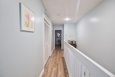 Discover elegance in this beautifully renovated townhome in on Meadowood Golf and Tennis Club in Florida - for sale on GolfHomes.com, golf home, golf lot