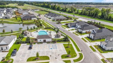 Welcome to The Willow, a stunning two-story home designed to on University Club in Louisiana - for sale on GolfHomes.com, golf home, golf lot