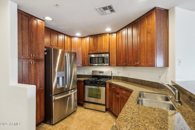 Discover luxury living in this stunning top-floor Toscana condo on Wildfire Golf Club in Arizona - for sale on GolfHomes.com, golf home, golf lot