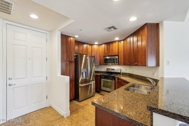 Discover luxury living in this stunning top-floor Toscana condo on Wildfire Golf Club in Arizona - for sale on GolfHomes.com, golf home, golf lot