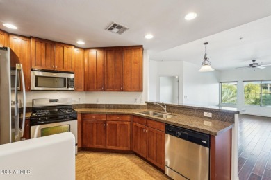 Discover luxury living in this stunning top-floor Toscana condo on Wildfire Golf Club in Arizona - for sale on GolfHomes.com, golf home, golf lot