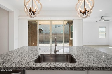 This stunning 3-bedroom, 2.5-bathroom home is nestled within a on Palm Valley Golf Club  in Arizona - for sale on GolfHomes.com, golf home, golf lot