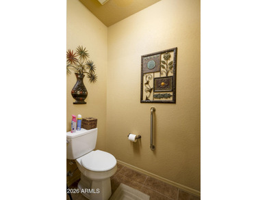 Sit on the north front patio and visit with friendly neighbors on Sunland Springs Golf Course  in Arizona - for sale on GolfHomes.com, golf home, golf lot