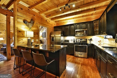 Welcome to this rare 4 bedroom, 3 1/2 bath LOG CABIN find in an on Bent Tree Golf Course in Georgia - for sale on GolfHomes.com, golf home, golf lot