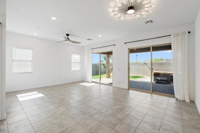 This stunning 3-bedroom, 2.5-bathroom home is nestled within a on Palm Valley Golf Club  in Arizona - for sale on GolfHomes.com, golf home, golf lot