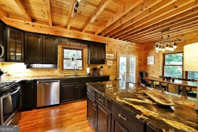 Welcome to this rare 4 bedroom, 3 1/2 bath LOG CABIN find in an on Bent Tree Golf Course in Georgia - for sale on GolfHomes.com, golf home, golf lot