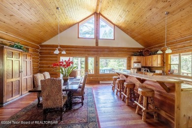 Escape to your own hand-hewn log retreat nestled in the woods of on Cedar Creek Golf Course in Wyoming - for sale on GolfHomes.com, golf home, golf lot