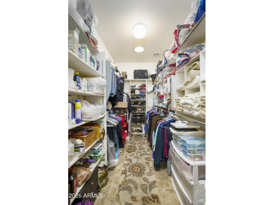 Sit on the north front patio and visit with friendly neighbors on Sunland Springs Golf Course  in Arizona - for sale on GolfHomes.com, golf home, golf lot