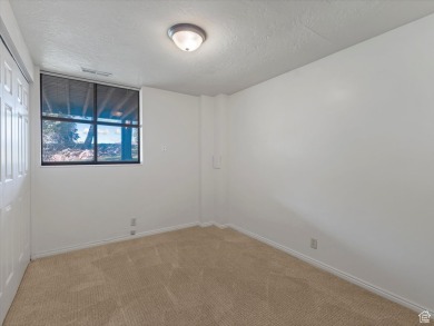 Experience serene living in this beautiful end-unit townhome on Bountiful Ridge Golf Course in Utah - for sale on GolfHomes.com, golf home, golf lot