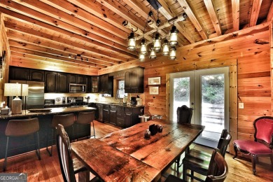 Welcome to this rare 4 bedroom, 3 1/2 bath LOG CABIN find in an on Bent Tree Golf Course in Georgia - for sale on GolfHomes.com, golf home, golf lot