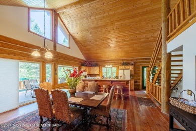 Escape to your own hand-hewn log retreat nestled in the woods of on Cedar Creek Golf Course in Wyoming - for sale on GolfHomes.com, golf home, golf lot