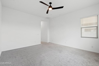 This stunning 3-bedroom, 2.5-bathroom home is nestled within a on Palm Valley Golf Club  in Arizona - for sale on GolfHomes.com, golf home, golf lot