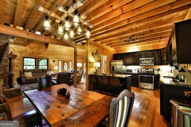 Welcome to this rare 4 bedroom, 3 1/2 bath LOG CABIN find in an on Bent Tree Golf Course in Georgia - for sale on GolfHomes.com, golf home, golf lot